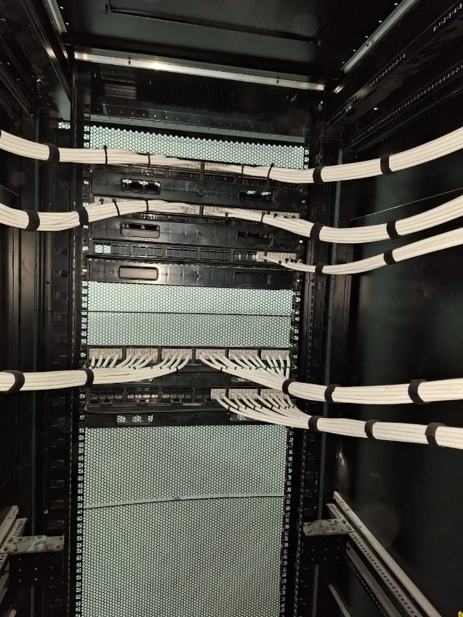 Rack build-out with dressed cable management